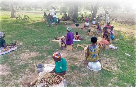Some women at Tindaamadoone community in the Kassena Nankana West District weaving some of the baskets.